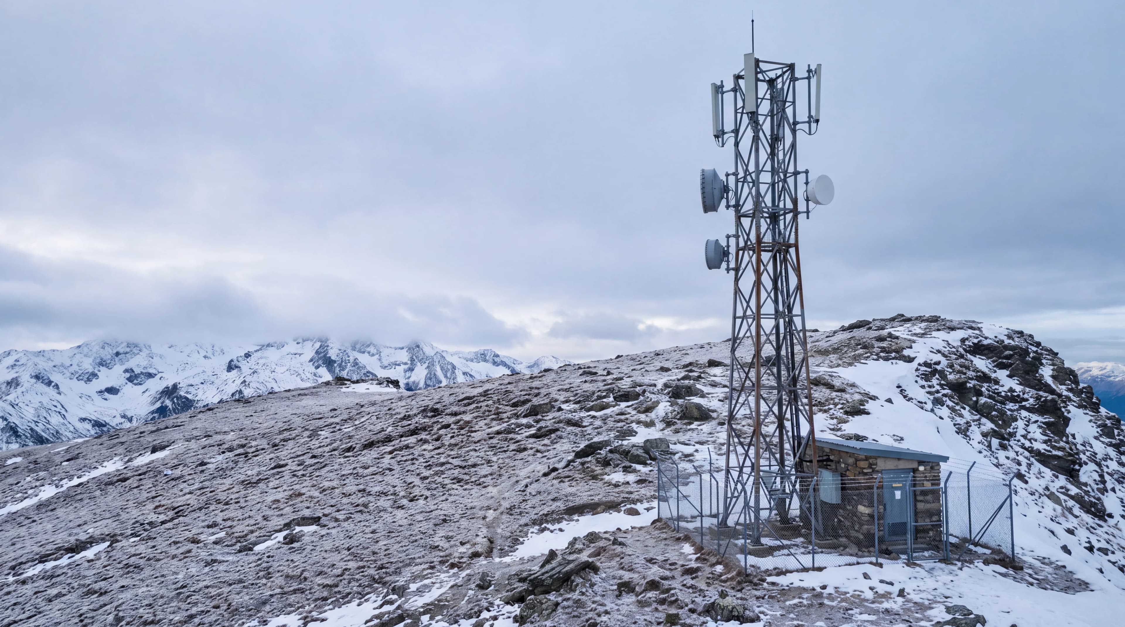 Communications station on a snowy mountain ridge